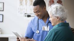 Doctor talking to patient