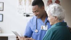 Doctor talking to patient