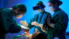 Surgeons working with VR headset