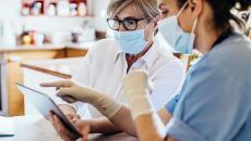 Healthcare worker with tablet