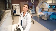 A radiologist checking a patient's scan